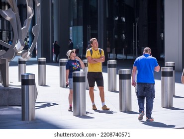 London, UK - June 22, 2022: People Walking On The City Of London Street. Busy Business Life Of The City. People Rush At Work  Street Photography