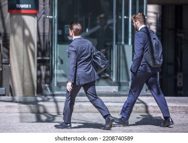 London, UK - June 22, 2022: Business People Walking In Early Morning By The Bank Of England. Busy Business Life Of The City. People Rush At Work  Street Photography