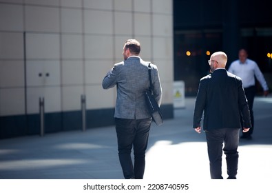 London, UK - June 22, 2022: Business People Walking In Early Morning By The Bank Of England. Busy Business Life Of The City. People Rush At Work  Street Photography