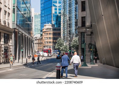 London, UK - June 22, 2022: People Walking In Early Morning In The City. Busy Business Life Of The City. People Rush At Work  Street Photography