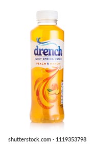 LONDON, UK - JUNE 23, 2018: Bottle Of Drench Juicy Spring Water Drink With Peach And Mango On White Background.