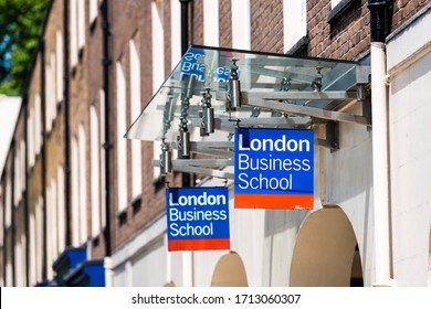 London, UK - June 24, 2018: Sunny Day With Street Road And University London Business School Blue Red Sign Closeup And Entrance To College