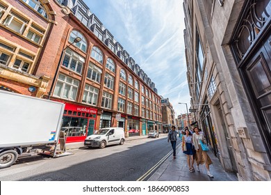 London, UK - June 24, 2018: Wardour Street Road With People Walking By Stores, Shops And Restaurants In Summer At Soho, West End Neighborhood Area Of United Kingdom