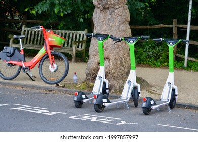 London, UK - June 27 2021: Electric Scooters And Bicycle