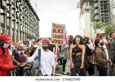 London, UK - June 27th 2020: Black Trans Lives Matter Protest Coincide With Date Of Cancelled London Pride, As Well As The Anniversary Of Shukri Abdi's Death. People Brought Flowers And Marched.