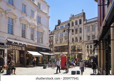 LONDON, UK - JUNE 3, 2014: Mayfair town houses and shops, center of London