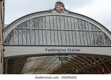 LONDON, UK - JUNE 30, 2014: Praed Street entrance of the Paddington railway station and the Victorian train shed. It is one of London's busiest and most important rail transport hubs.