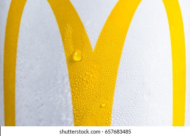 LONDON UK  - JUNE 4th, 2017: McDonald’s Logo On Ice Cold Drink Macro Close Up. Conceptual Image, The Success Of The World’s Largest Chain Of Hamburger Fast Food Restaurants By Appealing To Our Senses.