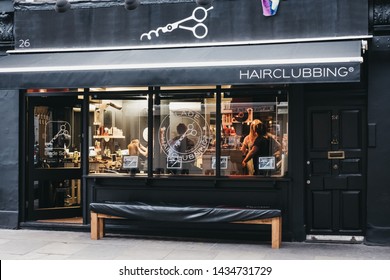 London, UK - June 5, 2019: Exterior of Hairclubbing, a trendy hair salon in Soho, London, with on-site bar that regularly hosts live jazz nights. 