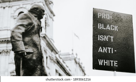 London  UK - June 6 2020:  Pro-black Isn't Anti-White Sign Juxtaposed Winston Churcill At Black Lives Matter Protest In London.