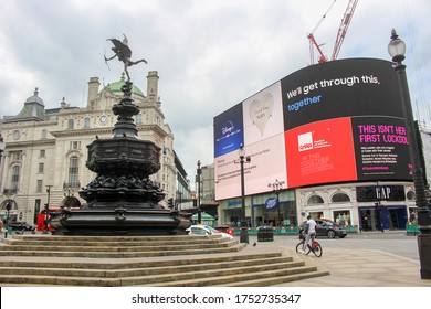 London / UK - June 9 2020: Empty and quiet Piccadilly Circus in London's west end during Covid 19 lockdown