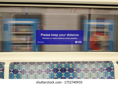 London / UK - June 9 2020: Keep Your Distance Poster On London Underground Victoria Line Tube Train During Covid 19 Lockdown 