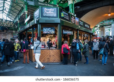 LONDON, UK - MAR 22: Unidentified people visit Borough Market in London on March 22, 2014. 