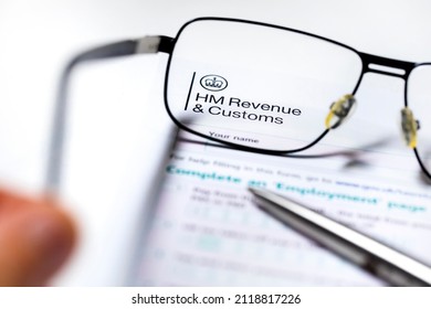 LONDON, UK - Mar 5th 2020: UK Tax Papers and Forms from HM Revenue Customs under a glass