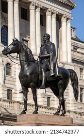 LONDON, UK - MARCH 08, 2022:  Equestrian statue of the Duke of Wellington in front of the Bank of England building