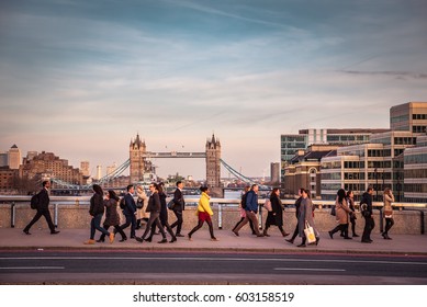 London , UK - March 13th 2017. London Rush Hour. Commuters And Office Workers Crossing London Bridge During Their Rush Hour Commute.