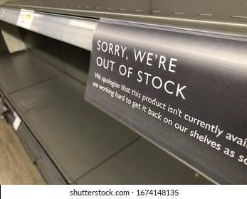 London, UK - March 16, 2020: Out Of Stock Sign In A Supermarket Shelf. Panic Buying And Stockpiling During The Coronavirus Crisis