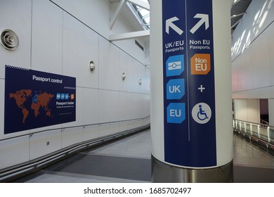 London, UK - March 17, 2019: A UK / EU Passport Control Sign Is Seen Directing Travellers To Immigration At Heathrow Airport.