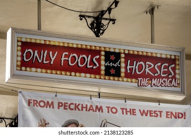 London, UK - March 17th 2022: Only Fools and Horses - The Musical signs outside The Royal Haymarket theatre, located on Haymarket in London, UK.