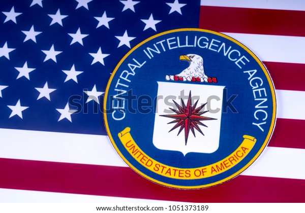 LONDON, UK - MARCH 18TH 2018: The symbol of the Central Intelligence Agency over the US Flag, on 18th March 2018.  The CIA is a civilian foreign intelligence service of the US federal government.