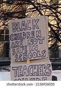 London, UK - March 18th 2022: Demonstrators Hold Placards And Give Speeches Outside Stoke Newington Police Station In Protest At The Strip Search Of Black School Girl Child Q