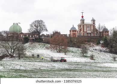 London, UK - March 19, 2018 - Park Rangers Putting Fence Up At Greenwich Park Covered In Winter Snow