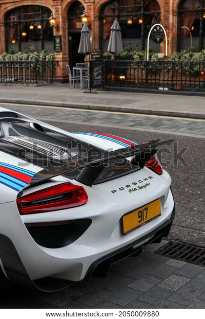 London, UK - March 2019: Back view photo\
of a Porsche 918 Spyder with the Martini\
livery.