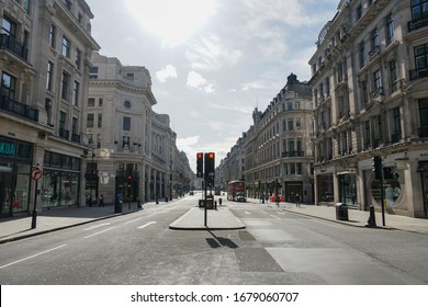 LONDON, UK  - MARCH 21, 2020: Regent Street Completely Deserted And Empty Due To COVID-19 (Coronavirus) Outbreak.