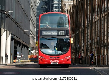 London, UK - March 23, 2022: A Head-on Shot Of A Red London Arriva Bus.