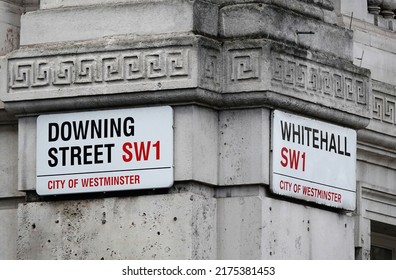 London, UK - March 23, 2022: Downing Street And Whitehall Street Name Signs On The Wall In London, SW1, UK.