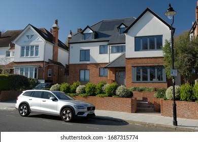 London / UK - March 24th 2020: Exterior street view of the perfect Highgate property with car parked out the front.