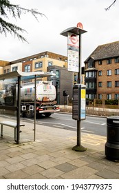 London UK, March 25 2021, Lorry Road Tanker Passing An Empty Bus Stop Or Shelter With No People