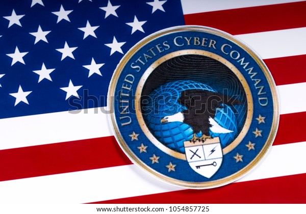 LONDON, UK - MARCH 26TH 2018: The symbol of the United States Cyber Command portrayed with the US flag, on 26th March 2018. 