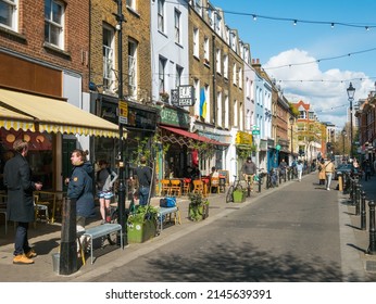 London, UK, March 26th 2022: A street view of Exmouth Market. Is a semi-pedestrianised street in Clerkenwell, Borough of Islington, and the location of an outdoor street market of 32 stalls. 