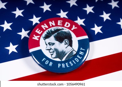 LONDON, UK - MARCH 27TH 2018: A Kennedy For President badge pictured over the USA Flag, on 27th March 2018.  John F Kennedy was the 35th President of the United States of America. 