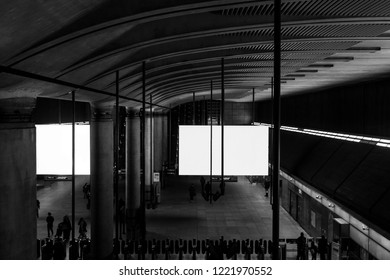 London, UK - March 28, 2018: Canary Wharf London Underground Tube Station With Blank Billboard.