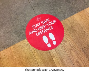 London, UK. May 11th 2020: Houndsditch post office. Customer floor sign, warning to stay safe and keep your distance. Lockdown, coronavirus outbreak, safety sticker, social distancing in a public area