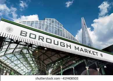LONDON, UK - MAY 12, 2016: Low angle view of Borough Market sign and The Shard