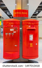 London, UK - May 12 2018: Royal Mail Post Box And Stamps Vending Machine At Heathrow Airport