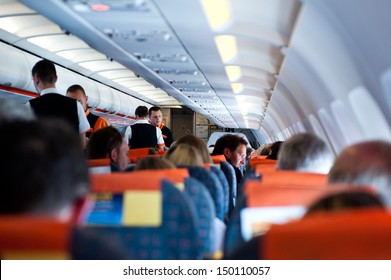 LONDON, UK - MAY 12: Flight Crew And Passengers On Board An Easyjet Flight From Ajaccio To London On May 12, 2013. IATA Forecast Shows That Airlines Expect To Welcome 3.6 Billion Passengers In 2016