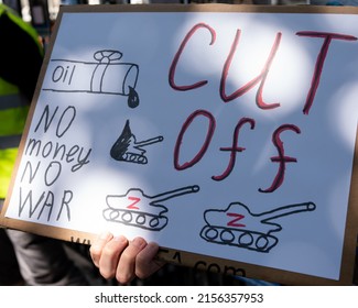 London, UK, May 14, 2022, Action Against The War In Ukraine. Protest Near The Russian Embassy. Demonstrator Holding A Sign With The Inscription 