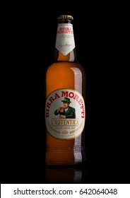 LONDON, UK - MAY 15, 2017: Bottle Of Birra Moretti Beer On Black Background, Italian Brewing Company, Founded In Udine In 1859 By Luigi Moretti