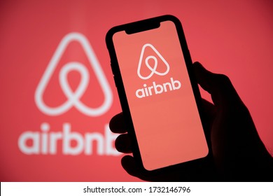 LONDON, UK - May 15 2020: Airbnb home holiday rental logo on a smartphone screen