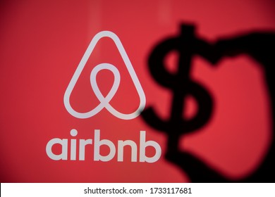 LONDON, UK - May 15 2020: Airbnb home vacation rental logo with a dollar symbol