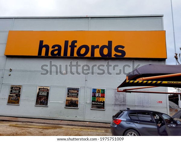London, UK- May 16, 2021: The retail shop of\
halfords in London.Halfords Group plc is a British retailer of car\
parts, car enhancement, tools, camping and touring equipment and\
bicycles.