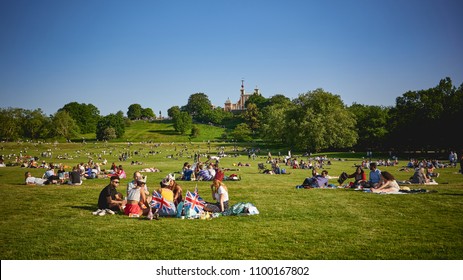 London, UK - May, 2018. People Relaxing In A Park. 