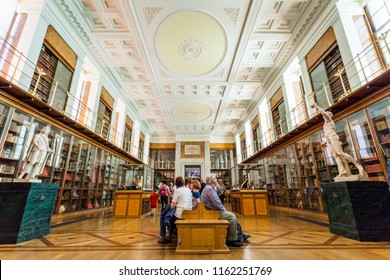 London, UK - May 2018: People Looking At Various Exhibits Inside The British Museum