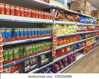 London, UK - May 2019: Supermarket Aisle Of Crispd, Snacks, Chips, Pringles