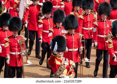 London UK, May 2022. Trooping the Colour, military parade at Horse Guards, Westminster with musicians from the massed bands. Guardsmen and women wear iconic black and red uniform and bearskin hats.
