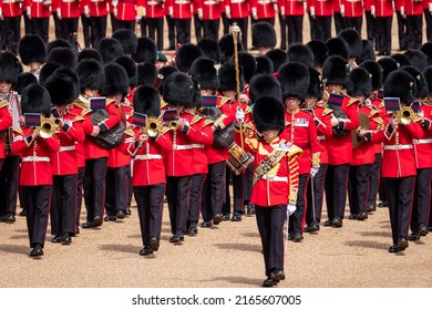 London UK, May 2022. Trooping the Colour, military parade at Horse Guards, Westminster with musicians from the massed bands. Guardsmen and women wear iconic black and red uniform and bearskin hats.